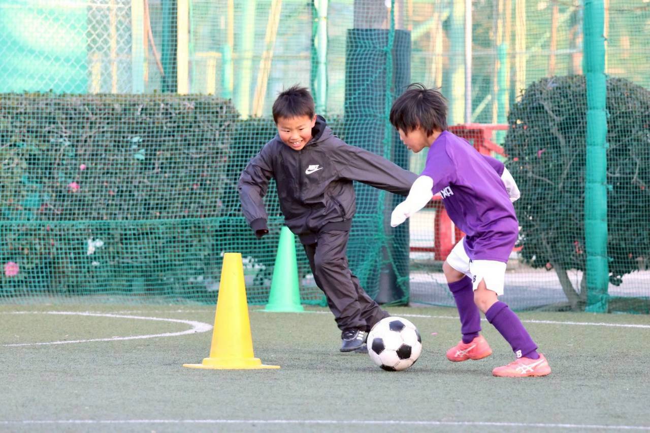 Smiling child playing sports